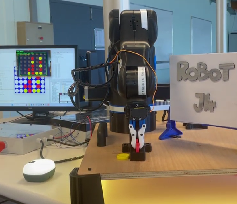 Robot arm placing a piece